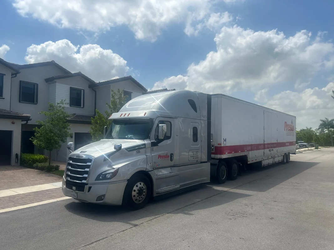 Presto Movers crew preparing a shipment for transport